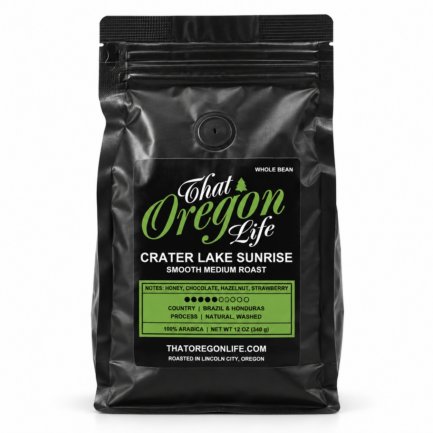 Crater Lake Sunrise Smooth Medium Roast whole bean coffee in a 12 oz black That Oregon Life bag on a white background
