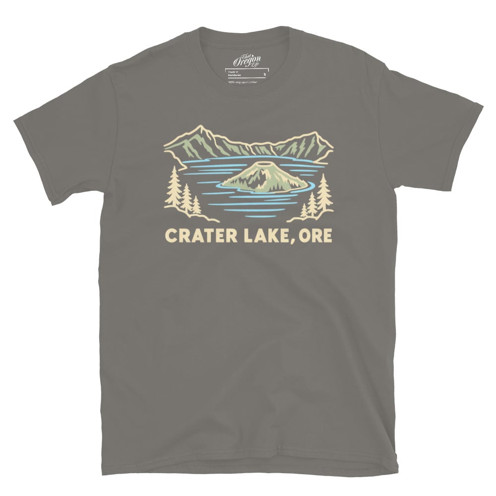 Charcoal Crater Lake Oregon tee with pale line art of Wizard Island, mountains, evergreen trees, and CRATER LAKE, ORE lettering.