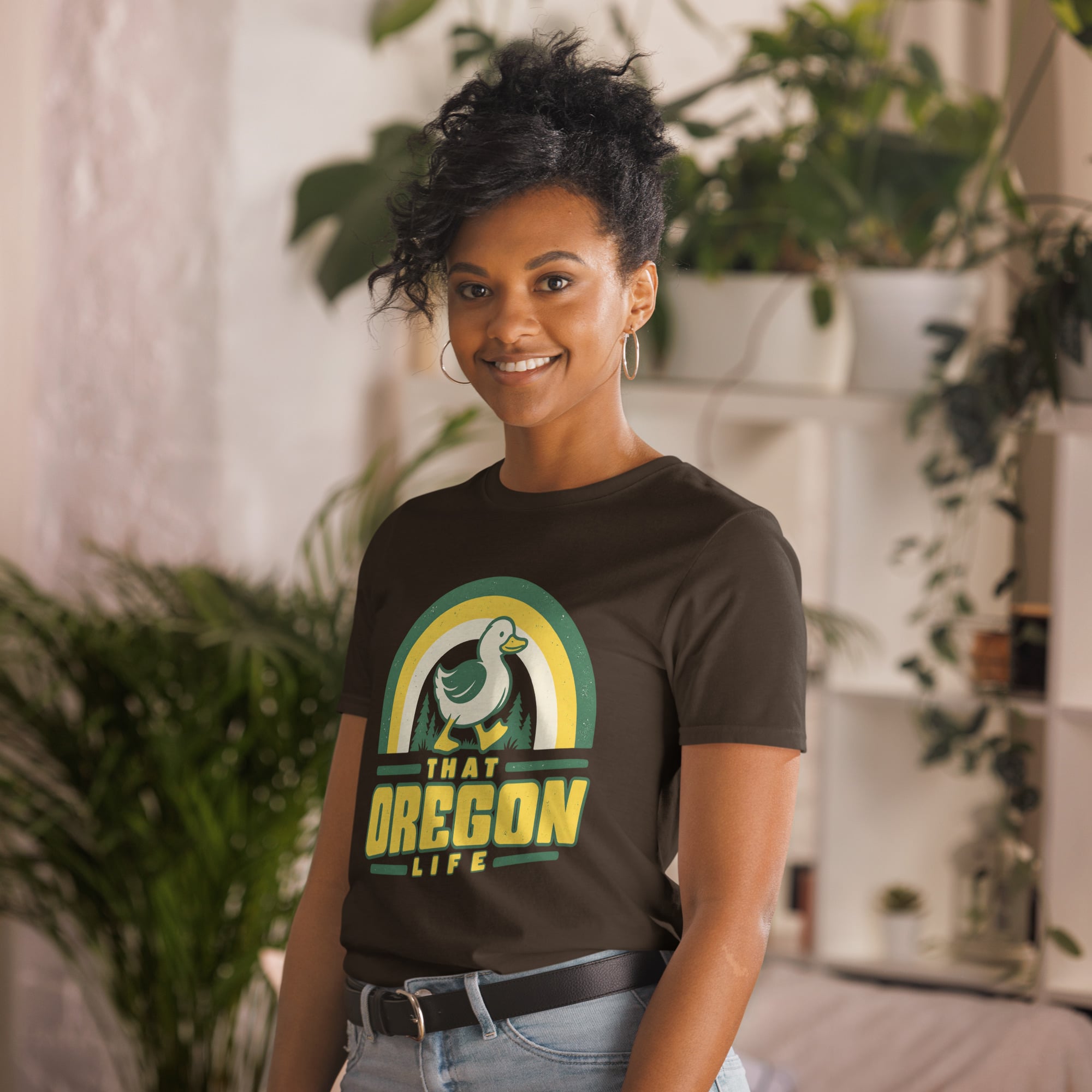 Model wearing the Dark Chocolate Retro Rainbow Duck Tee outdoors